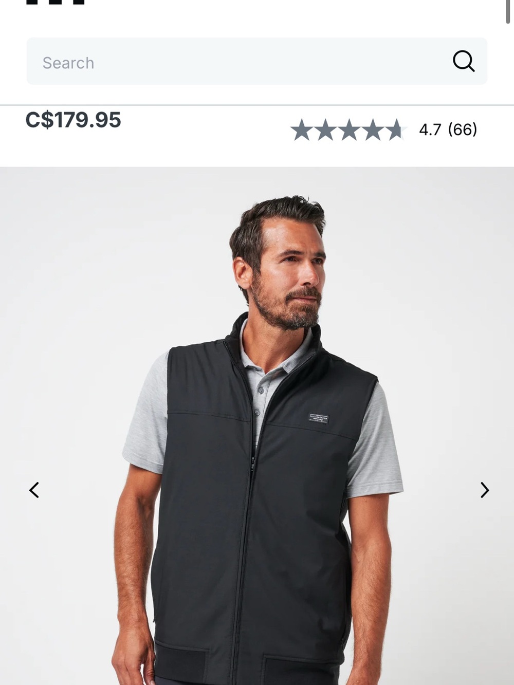 Travis Mathew Black Softshell Zip Vest wanderlust.